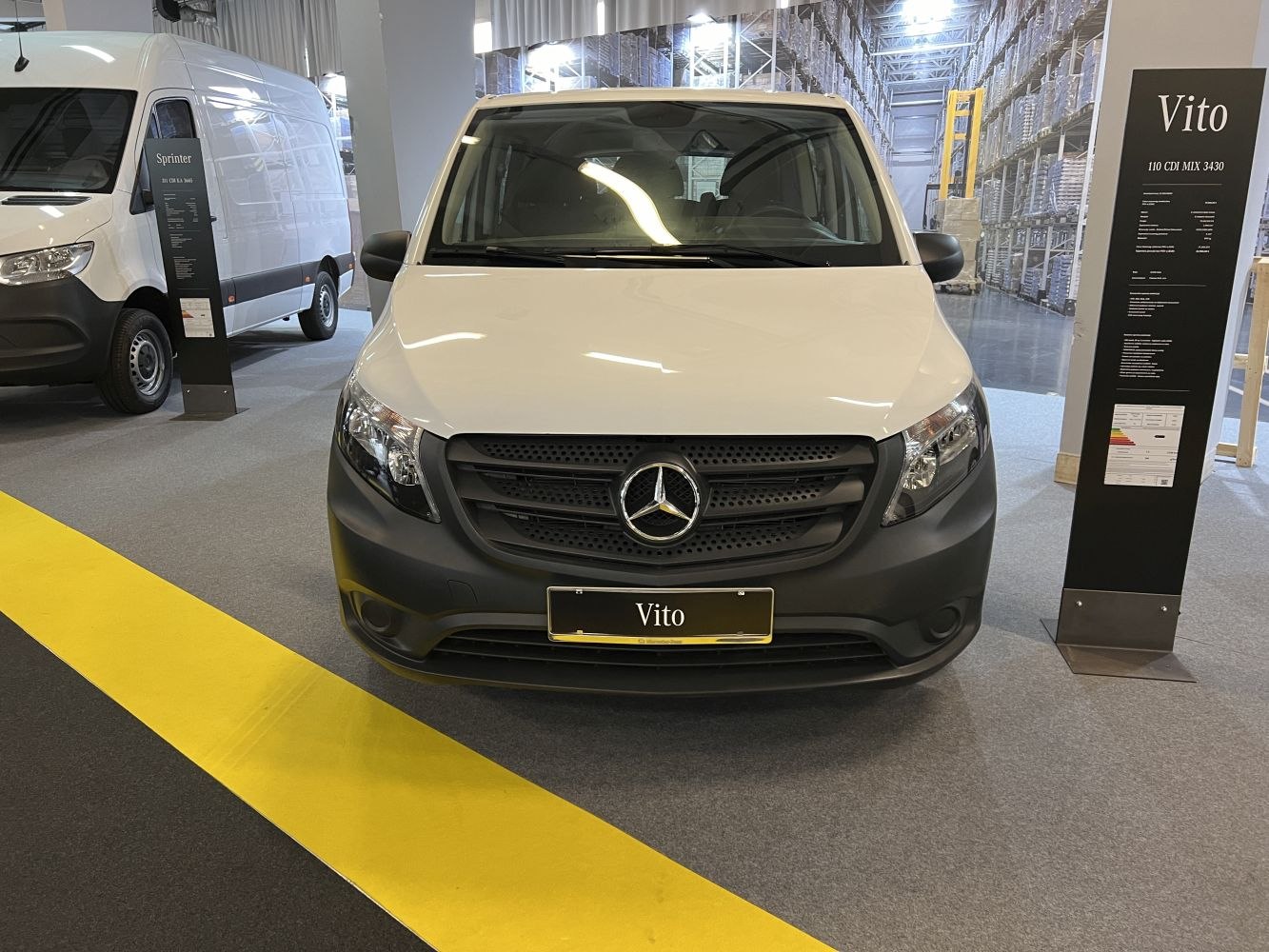 Front view of large van with black grille and headlights