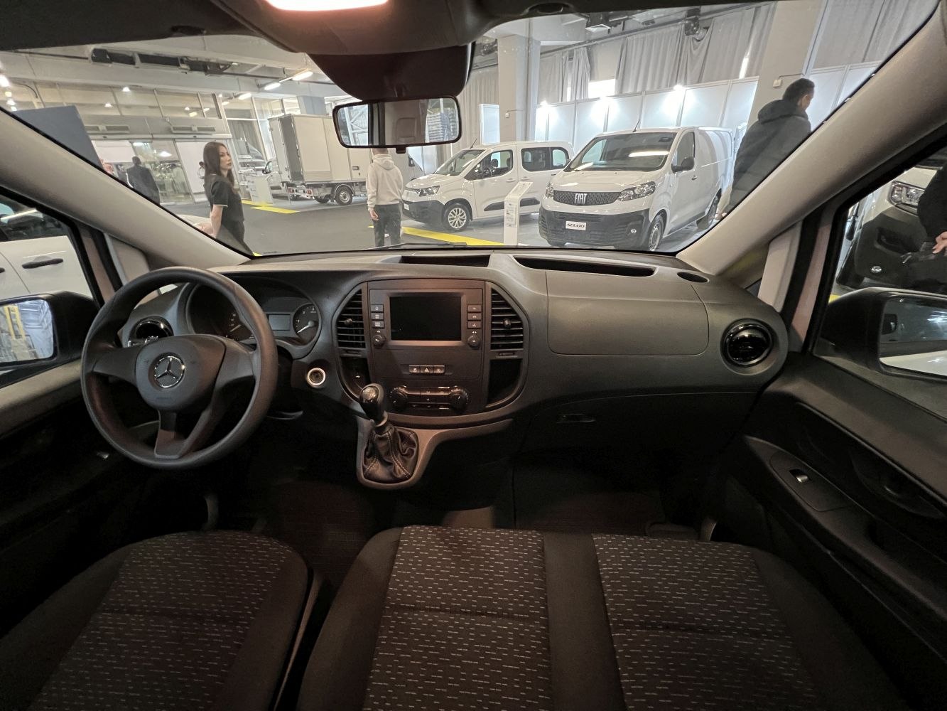 Van interior dashboard with steering wheel and gear shifter