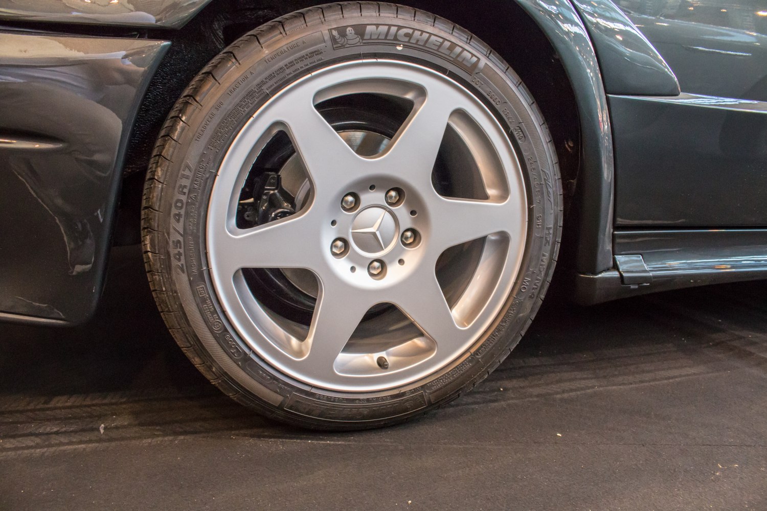 Five-spoke alloy wheel with Michelin tire on facelift vintage car