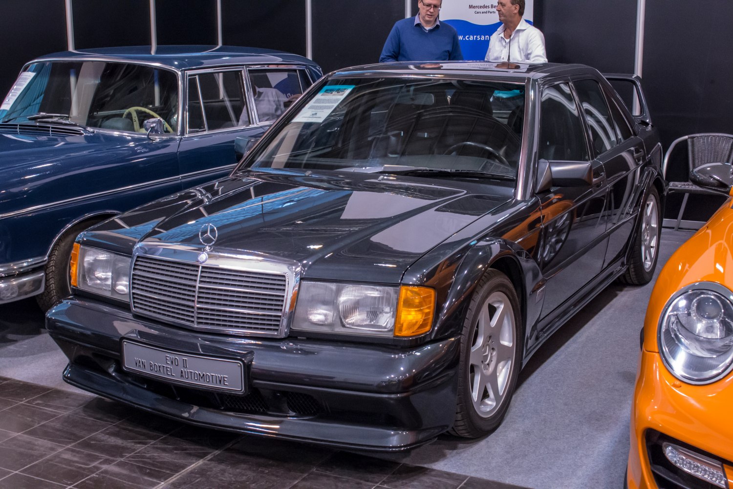 Sporty black sedan with EVO II body kit and classic rectangular grille