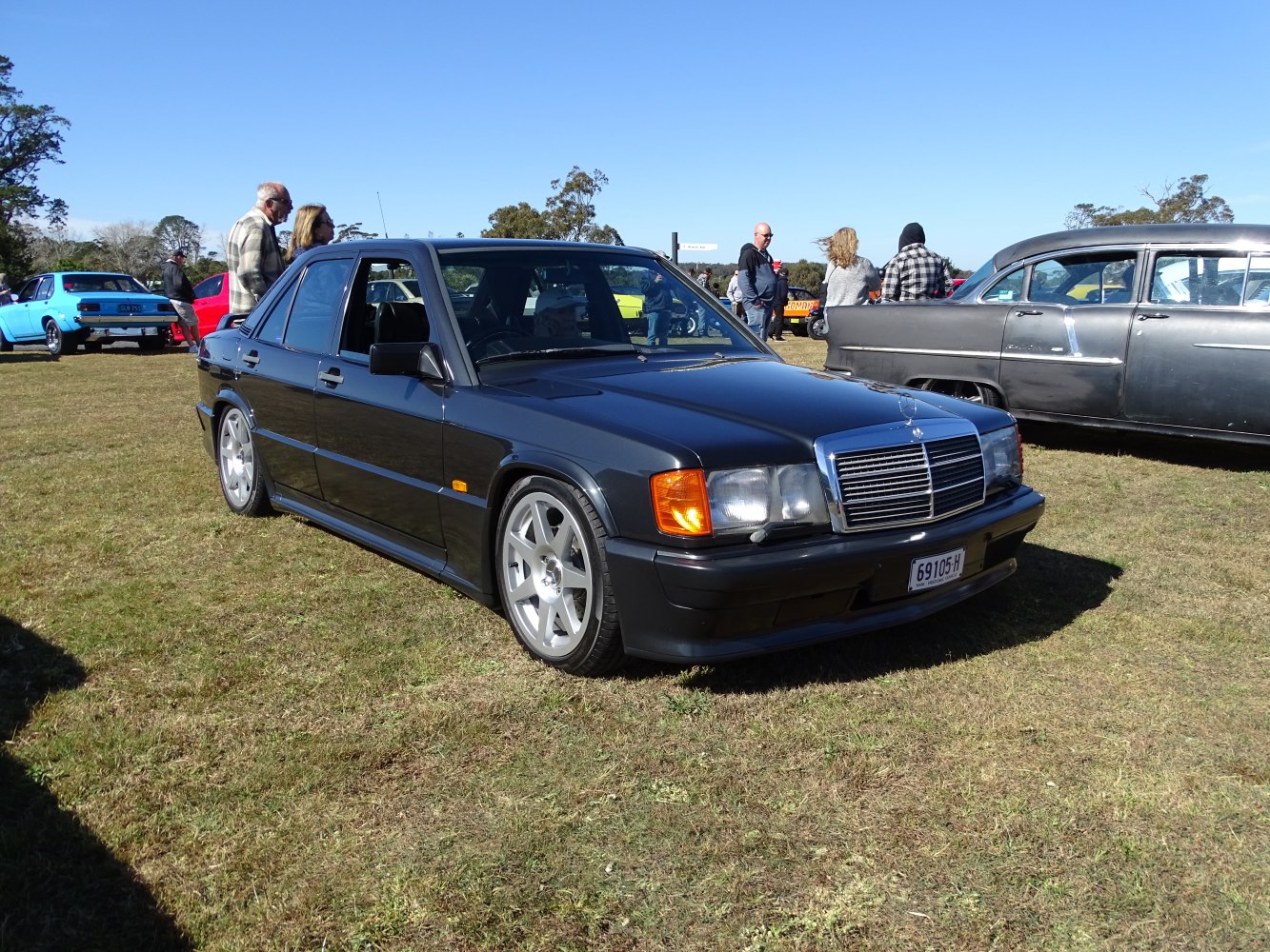 Front three-quarter view, alloy wheels, dual rectangular headlights