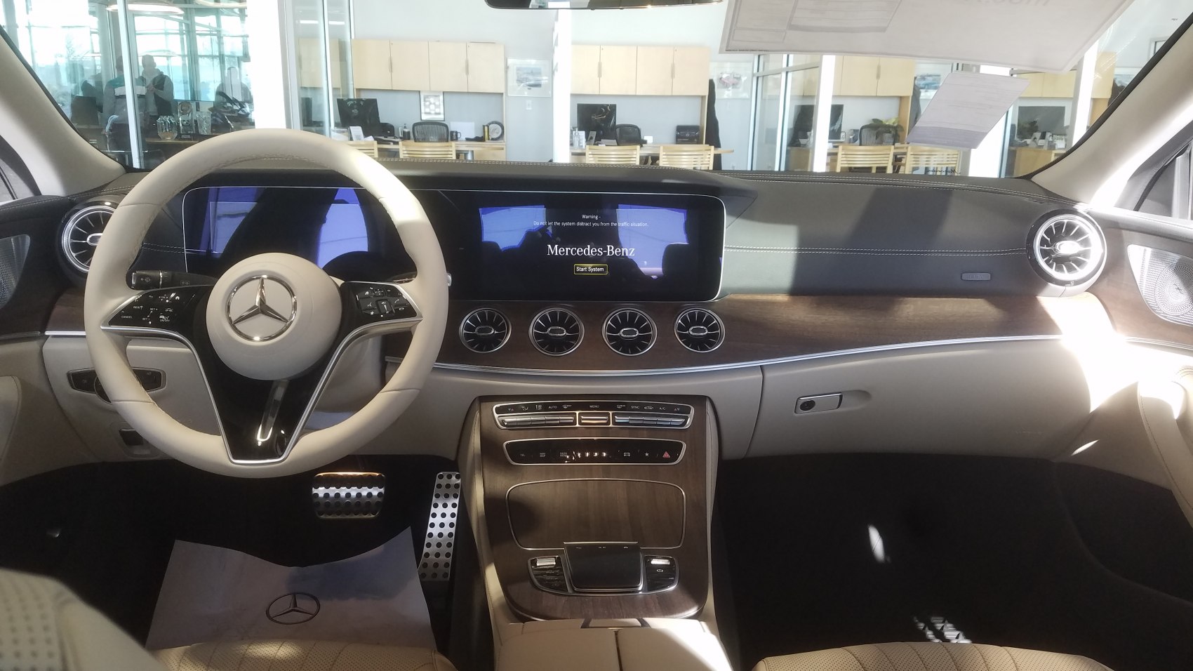 Luxury car interior with digital dashboard and multifunction steering wheel