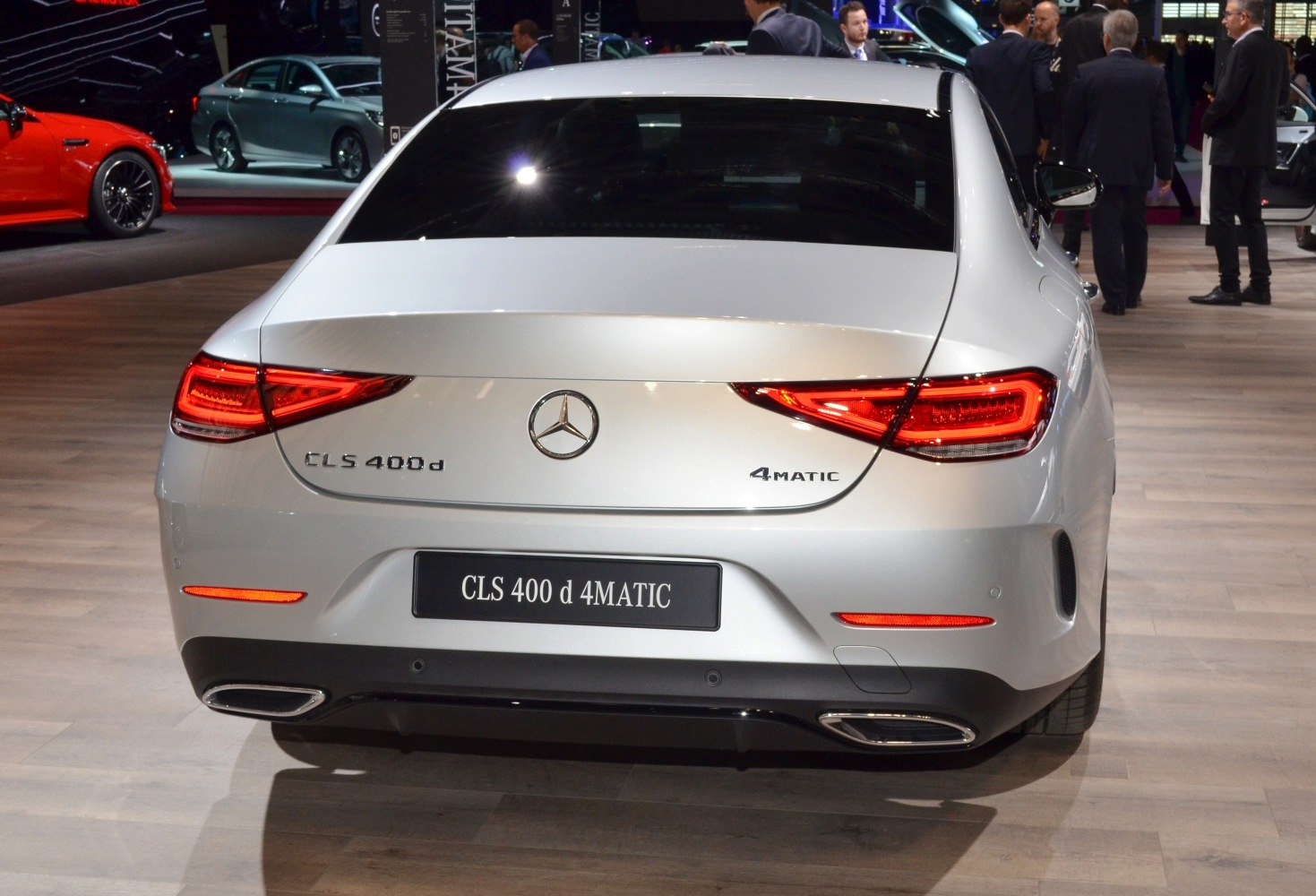 Rear view with LED taillights and dual exhaust of a luxury coupe.