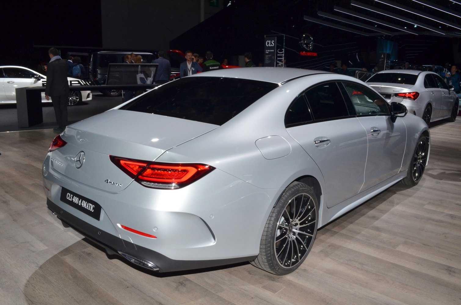 Sleek rear three-quarter view with LED taillights and alloy wheels