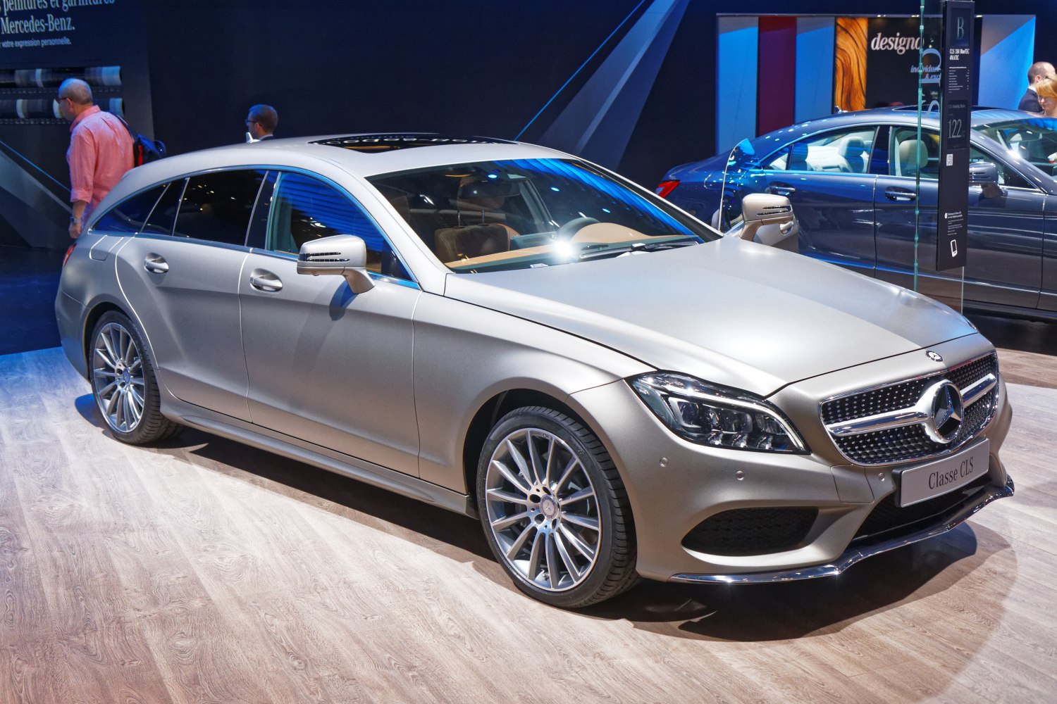Metallic silver luxury wagon with LED headlights and multi-spoke alloy wheels
