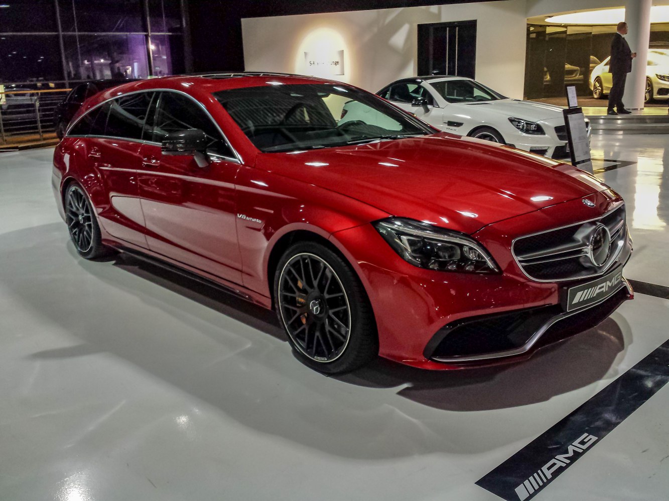 Red Mercedes-Benz AMG shooting brake front-side view with V8 biturbo badge