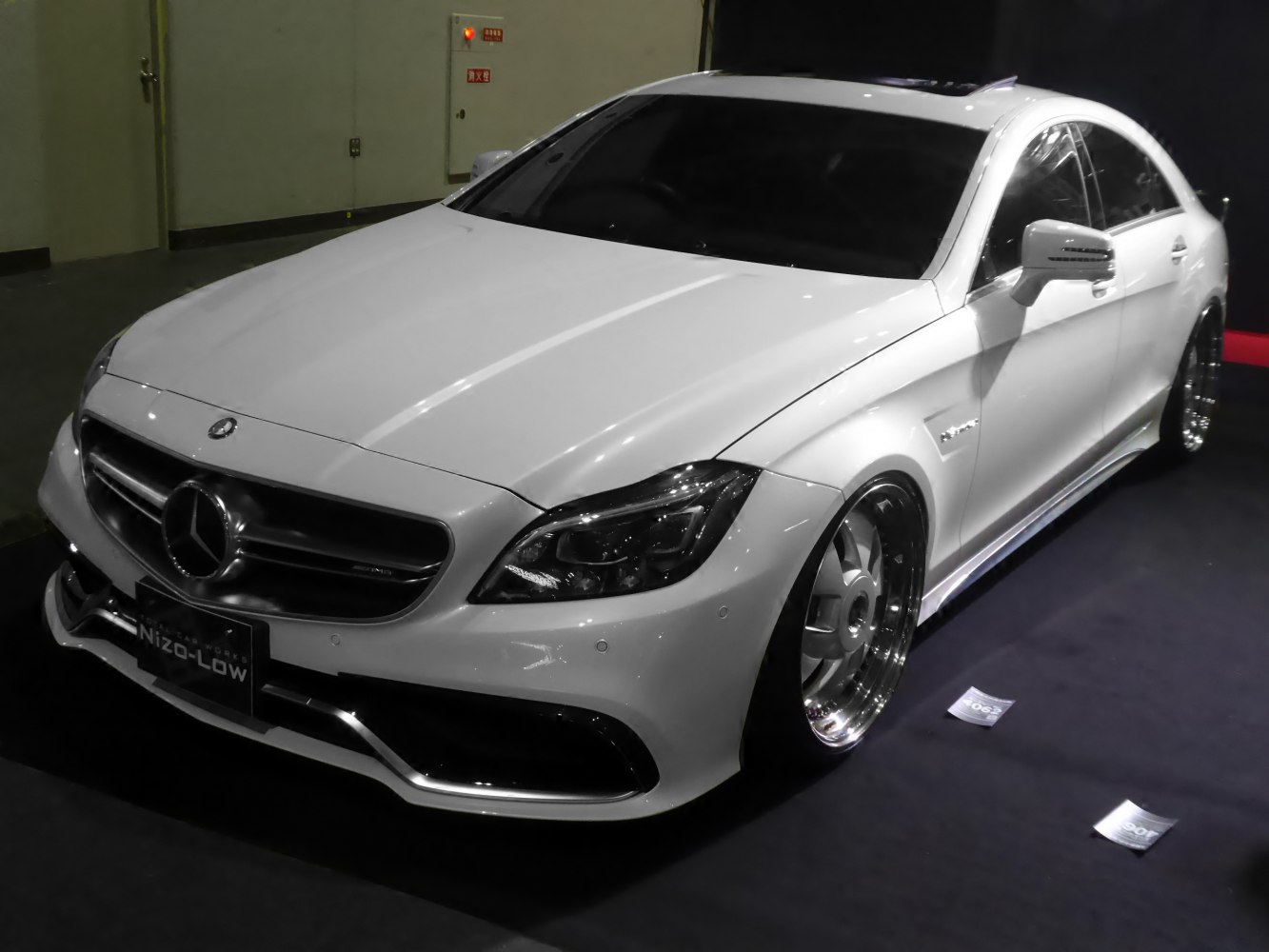 Front angled view with custom rims and sharp headlights