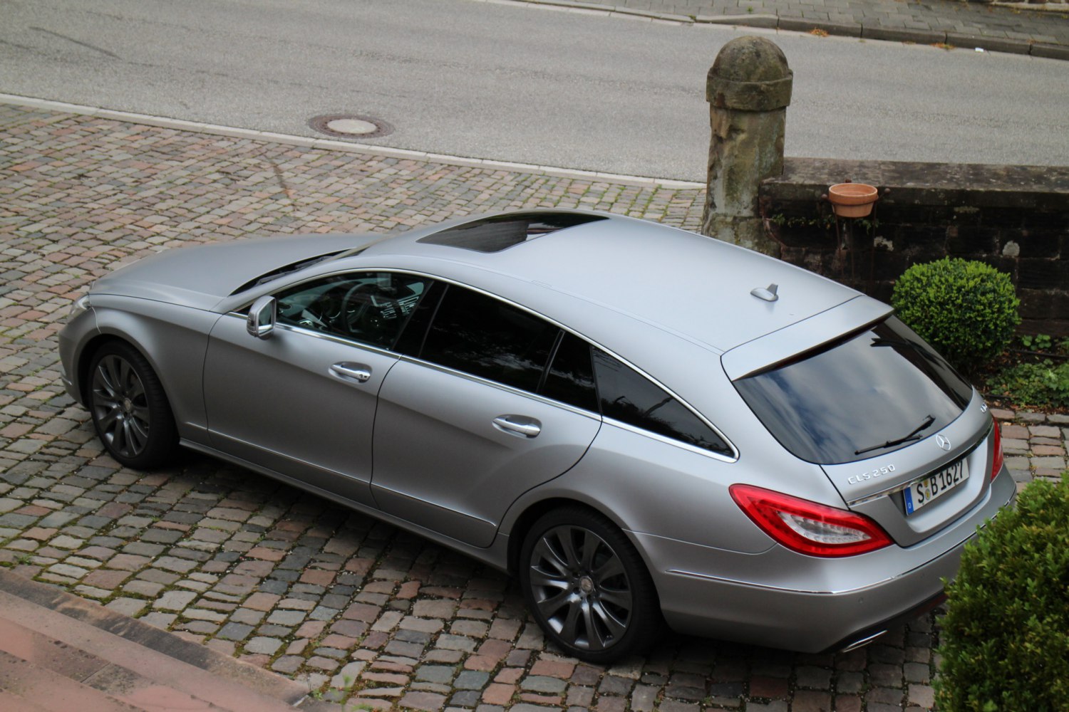 Silver estate body with panoramic sunroof and tinted windows