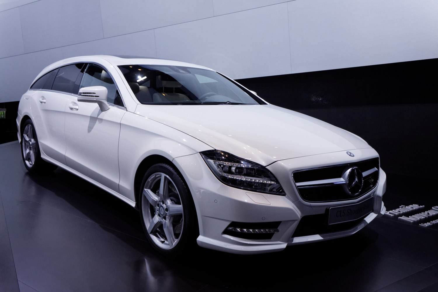 Front view of a luxury station wagon with LED headlights and alloy wheels