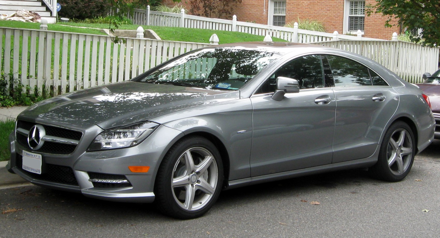 Sleek front-side view of a luxury coupe with alloy wheels