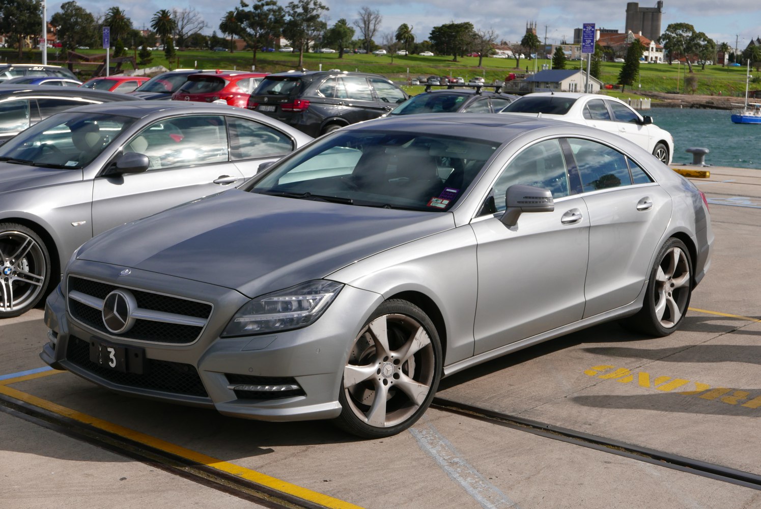 Silver luxury coupe with distinctive grille and sleek body lines
