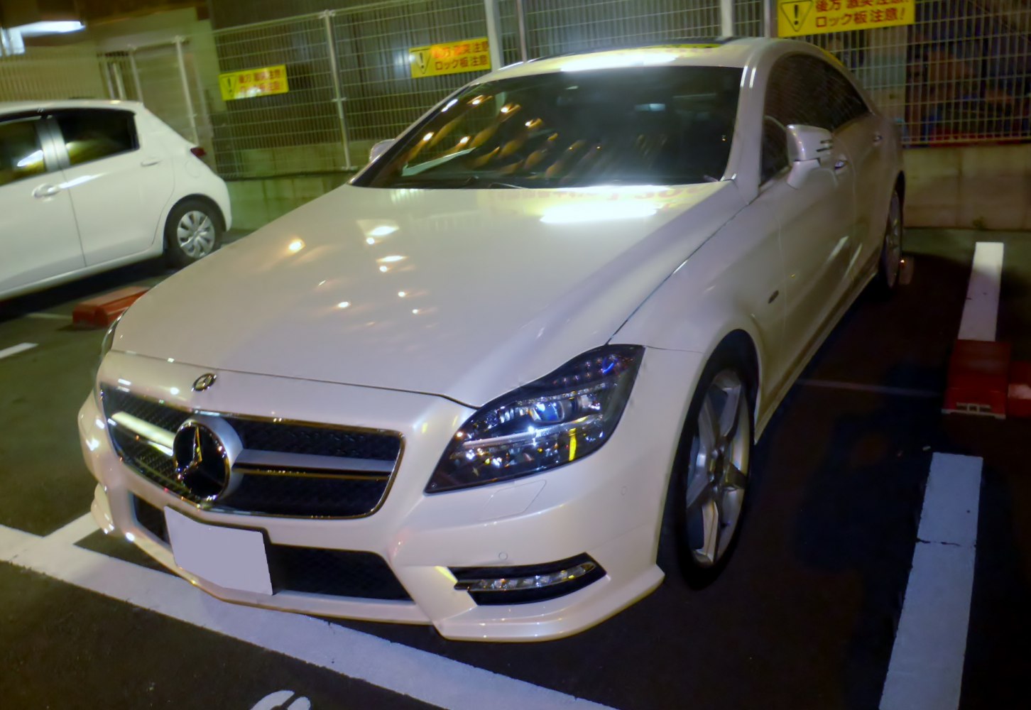 Front view with sleek headlights and prominent grille
