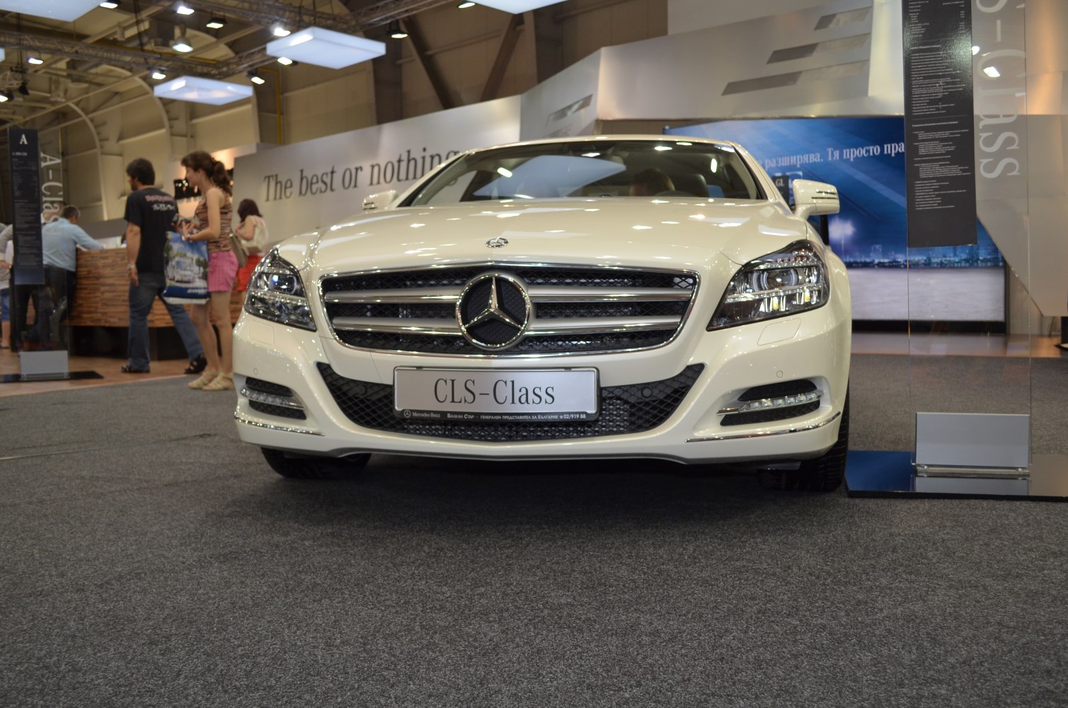 Front view with distinctive grille and headlight design