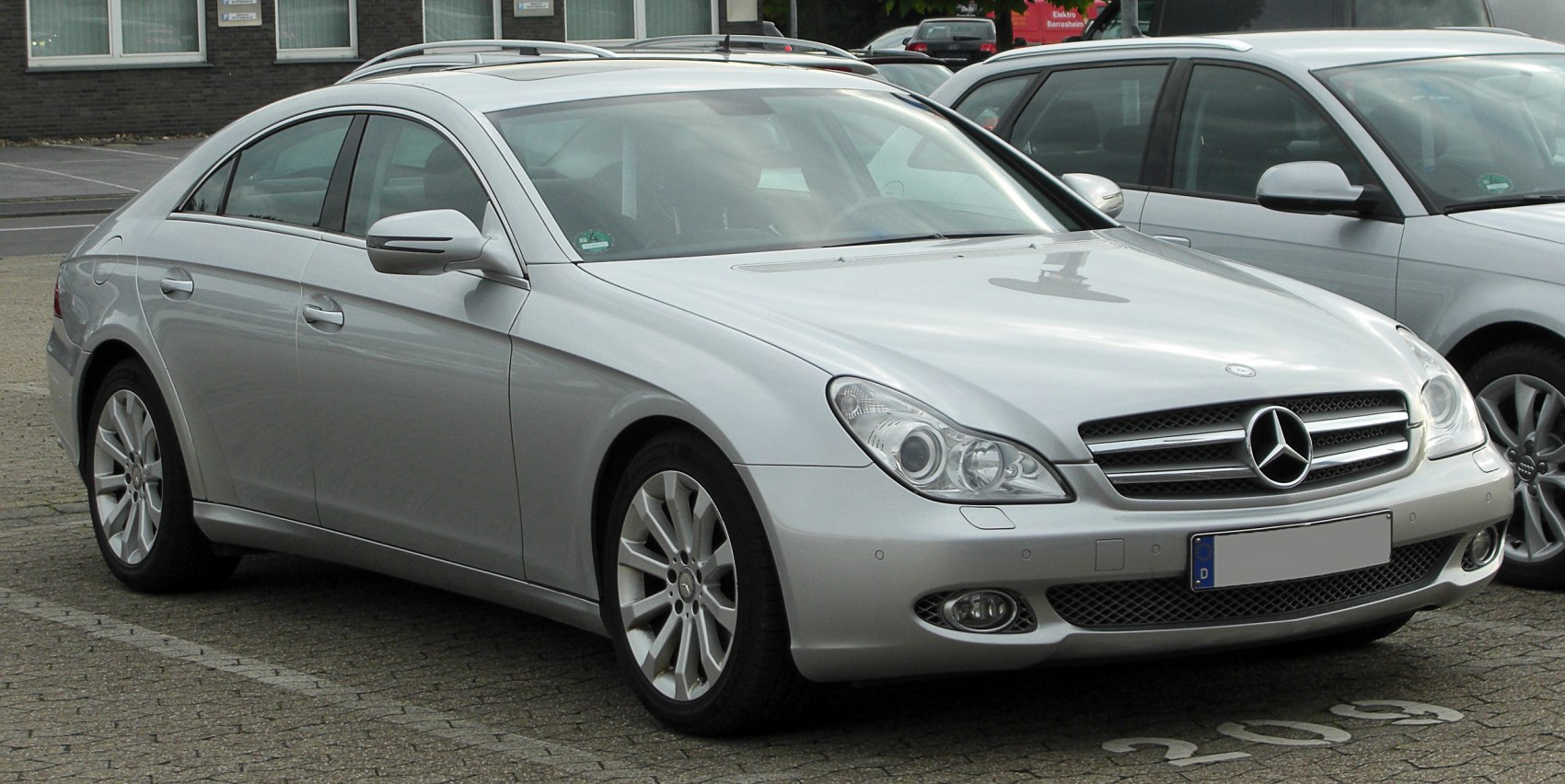 Sleek front design with distinct headlights and alloy wheels