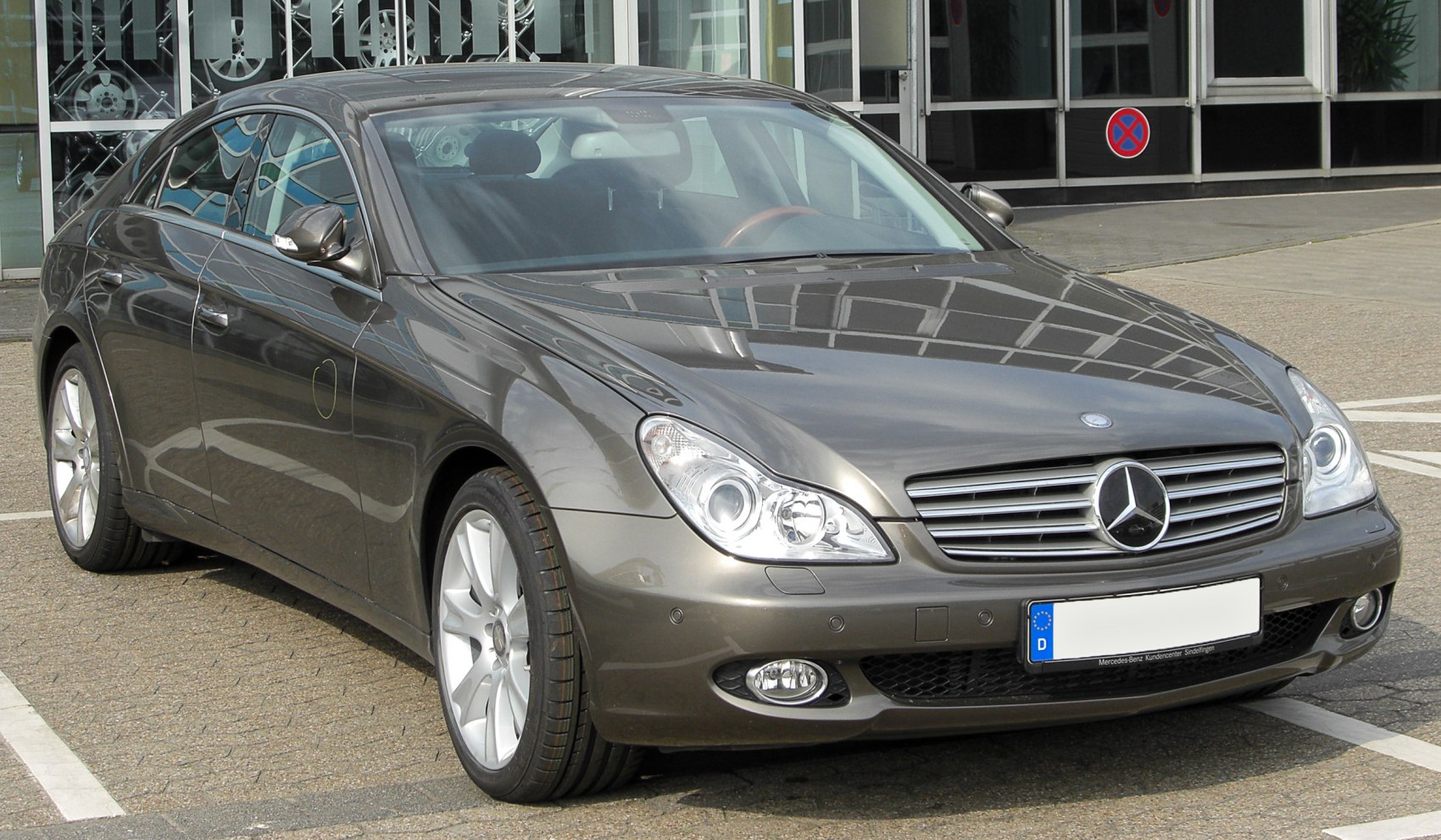Front view showing aerodynamic headlights and grille of a sleek coupe