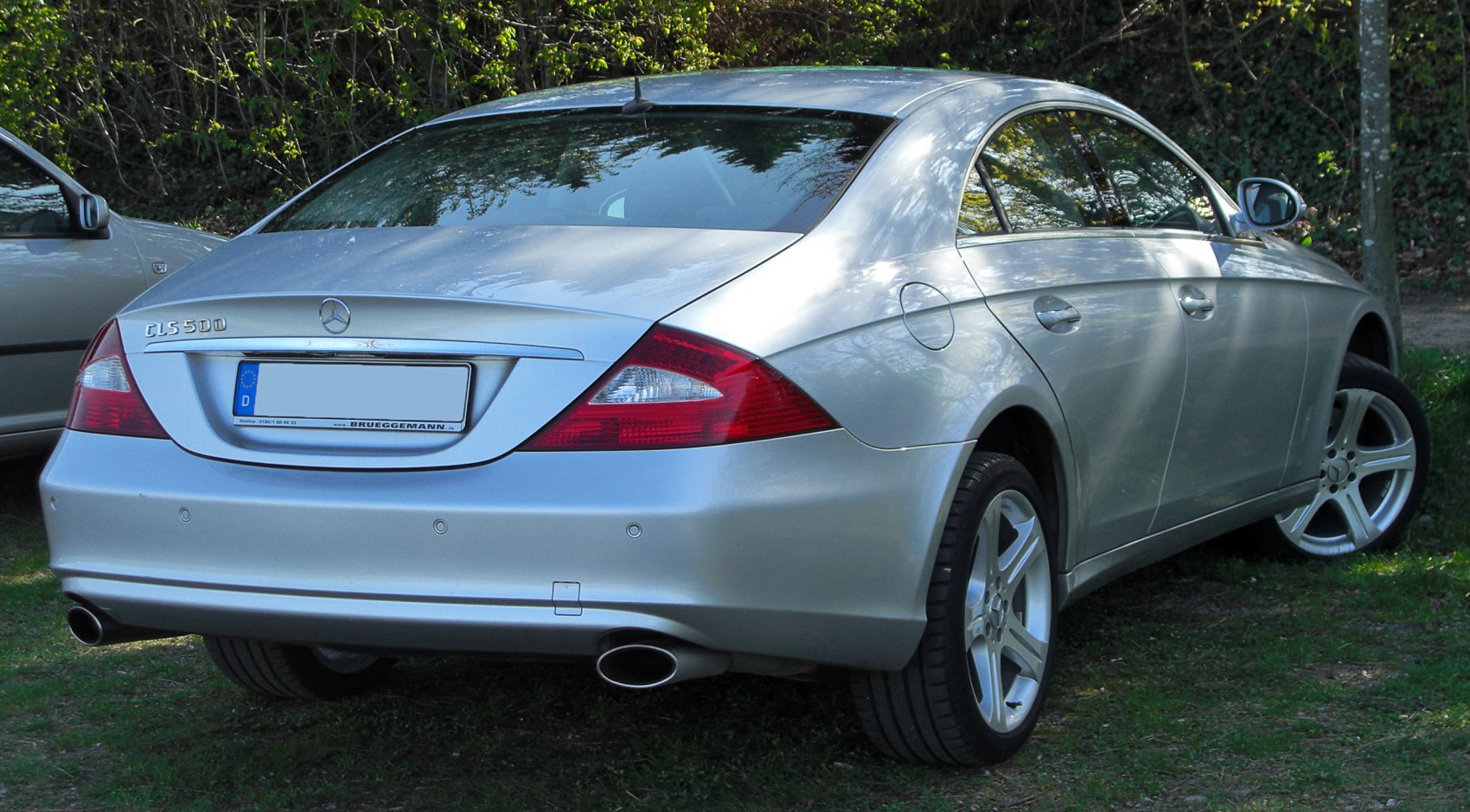 Rear view with distinctive taillights and dual exhaust