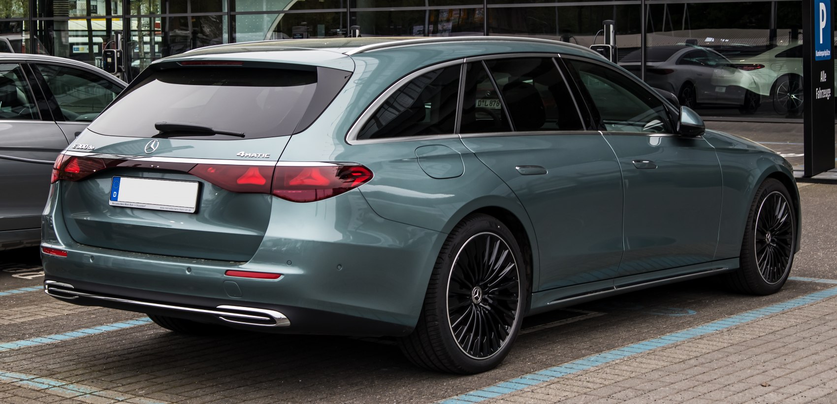 Sleek rear design and 4MATIC badge of a modern luxury station wagon.