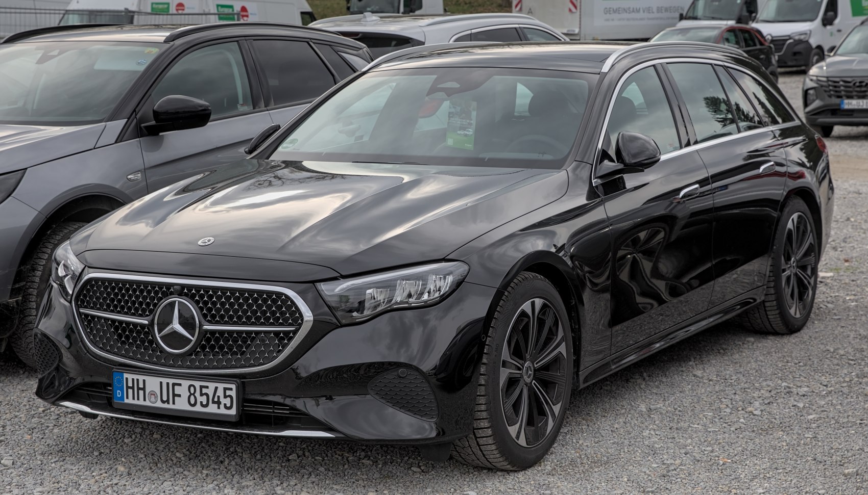 Diamond grille and LED headlights on a sleek black premium wagon