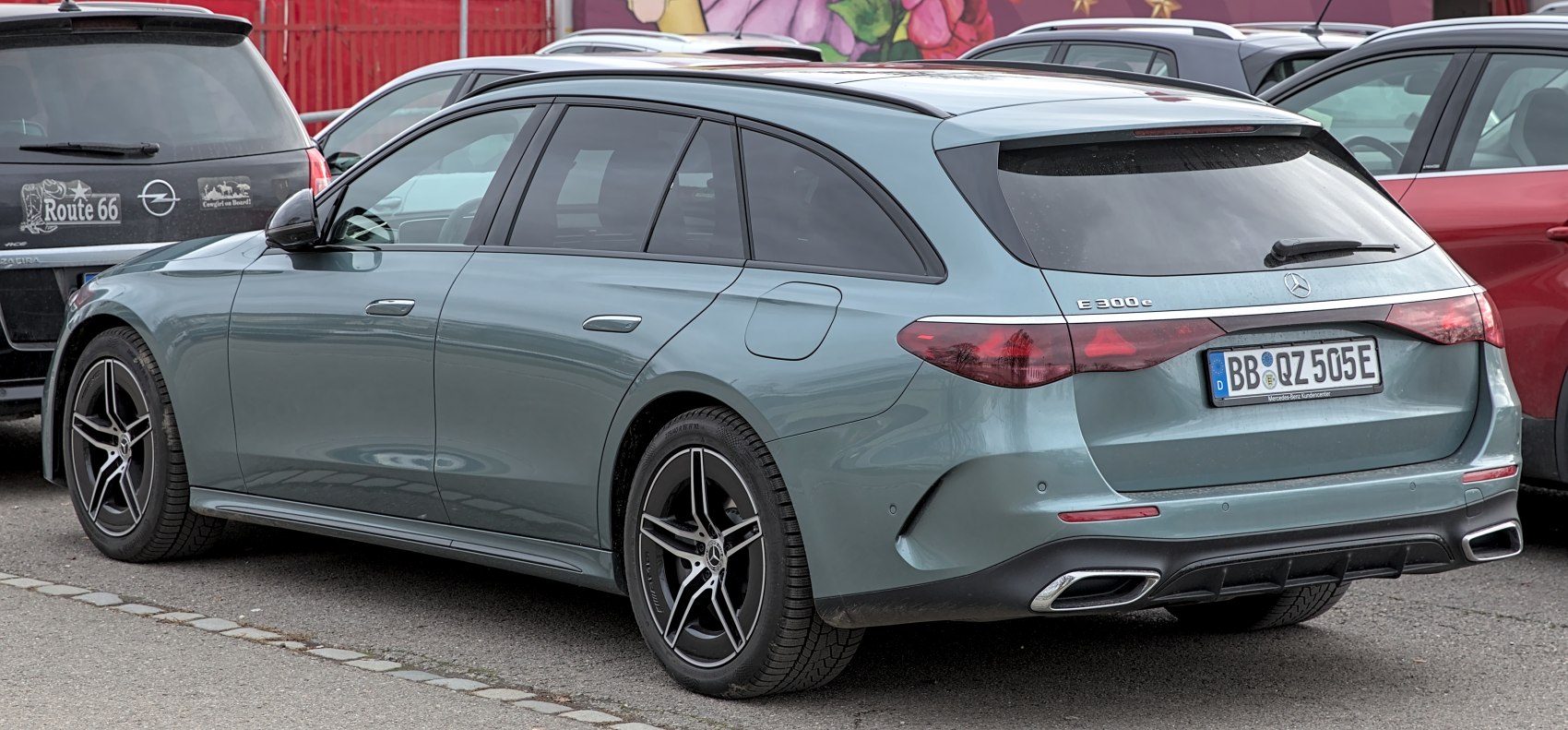 Luxury wagon rear with tail light bar and dual exhaust tips