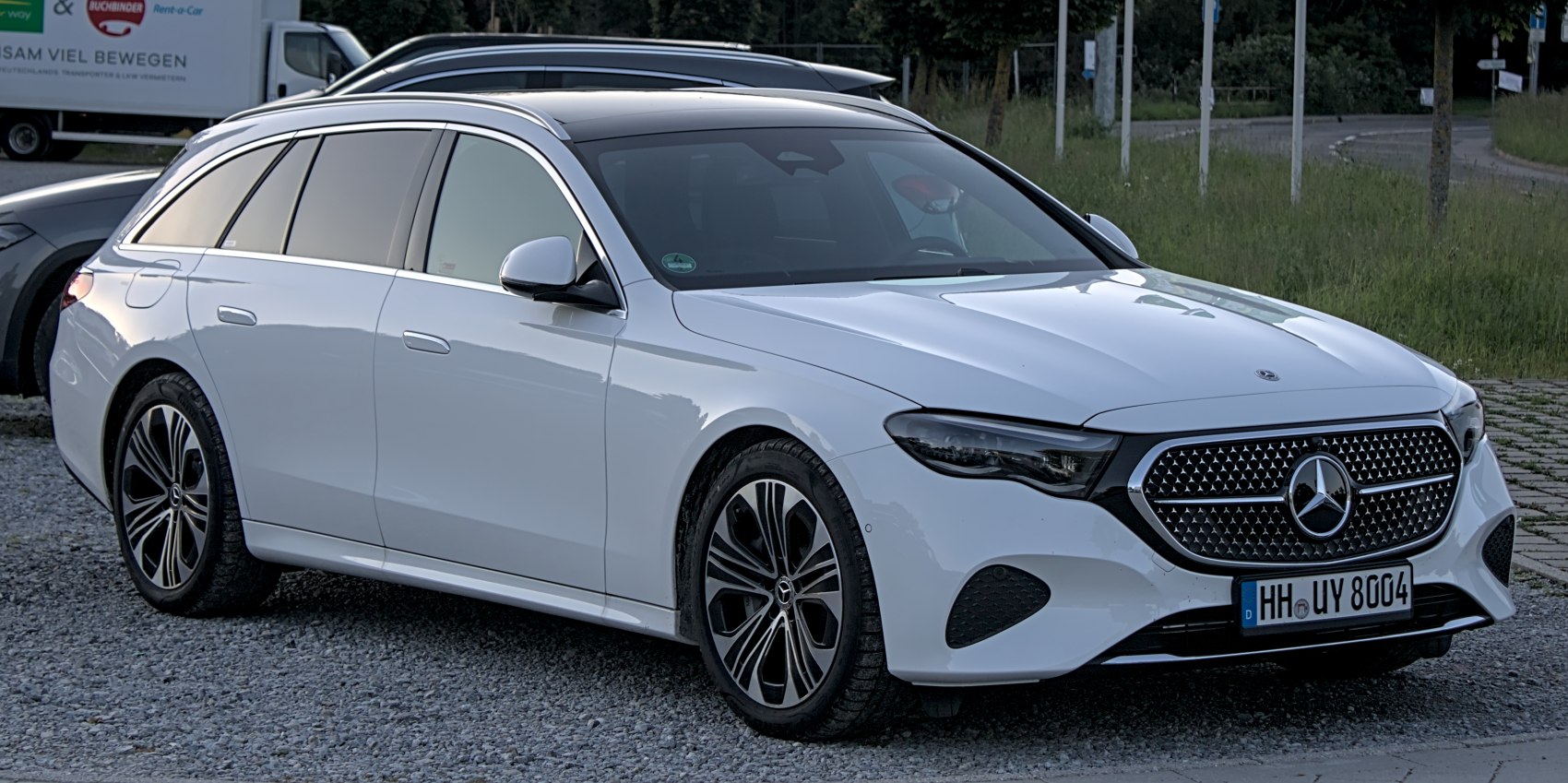 Silver luxury estate with distinctive front grille and wheel design