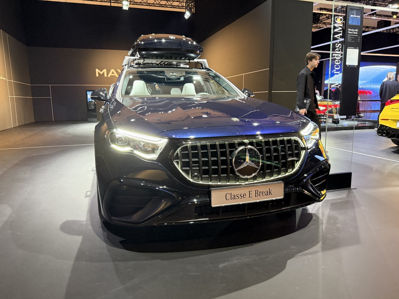 Luxury station wagon front with LED headlights and roof cargo box