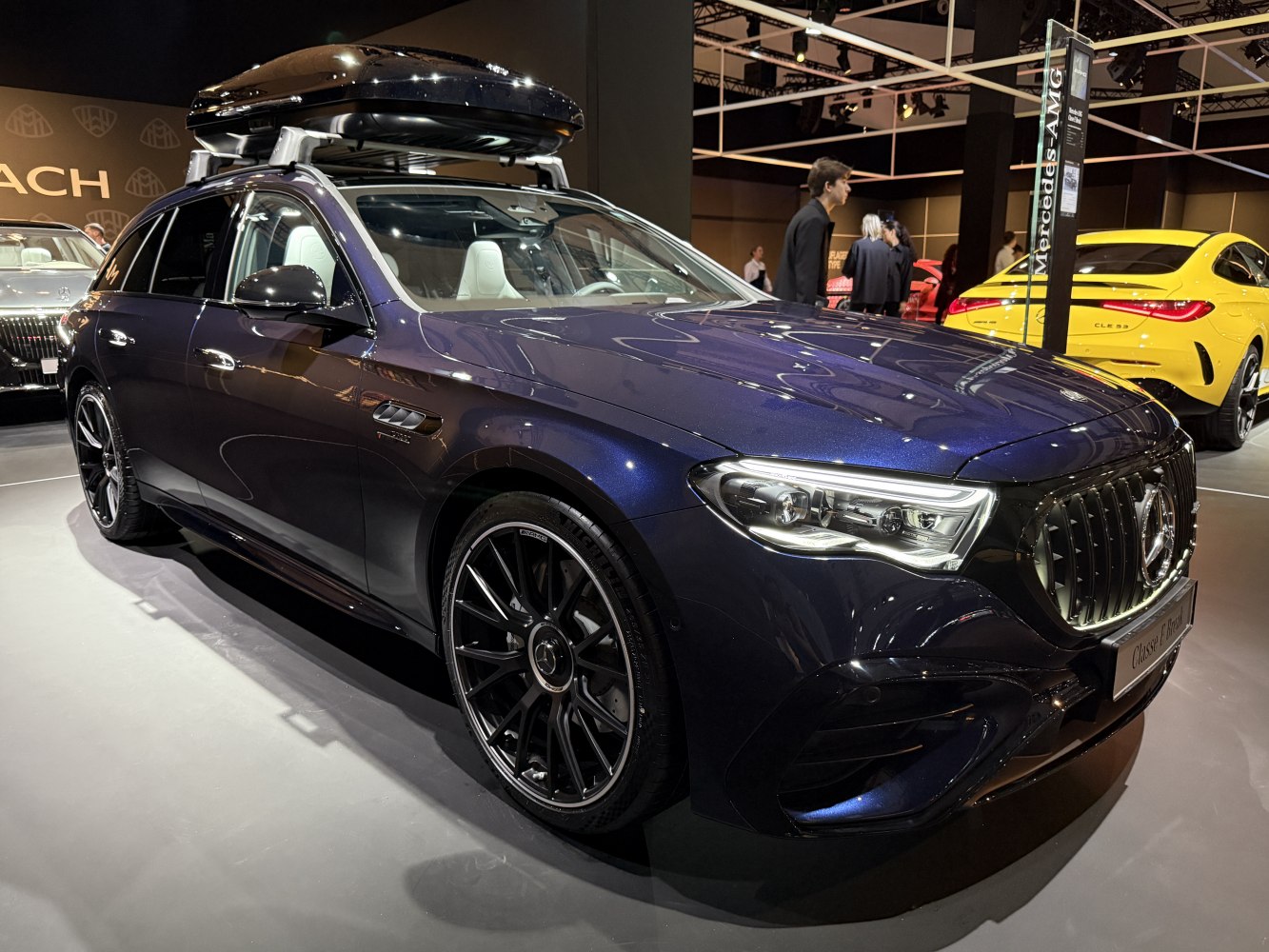 Luxury wagon with roof box and AMG wheels