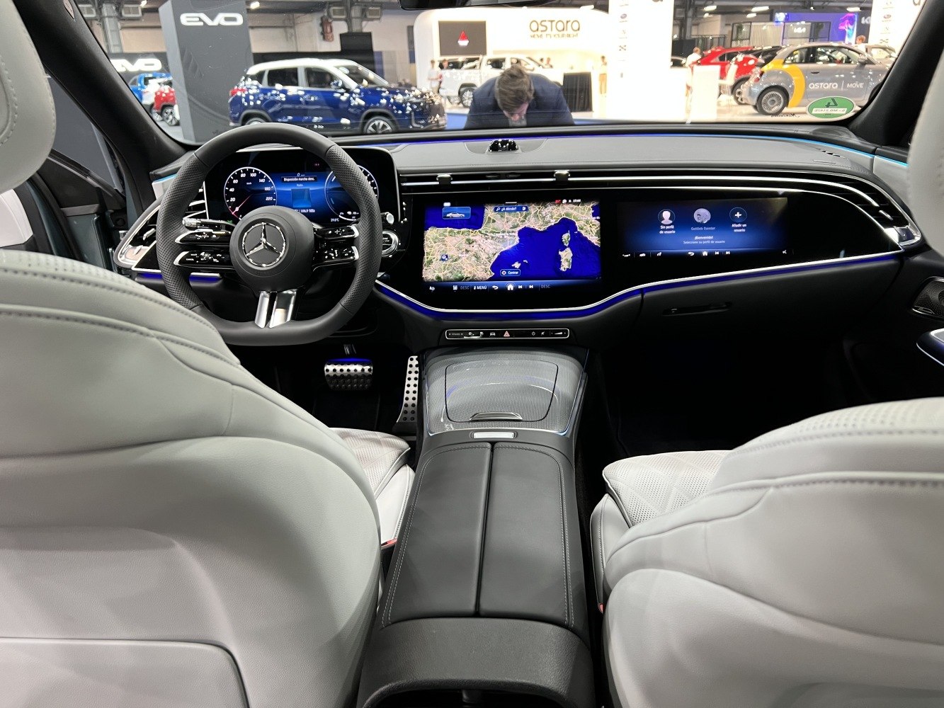 Digital dashboard, dual wide infotainment screens, luxury steering wheel