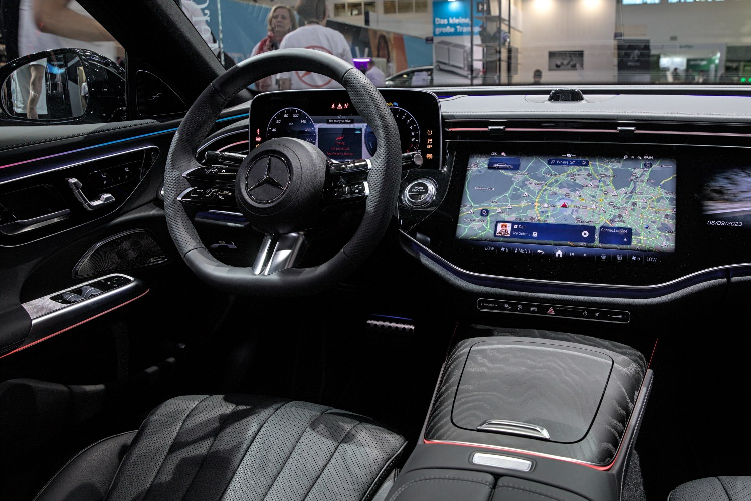 Digital dashboard and navigation screen with luxury interior seating
