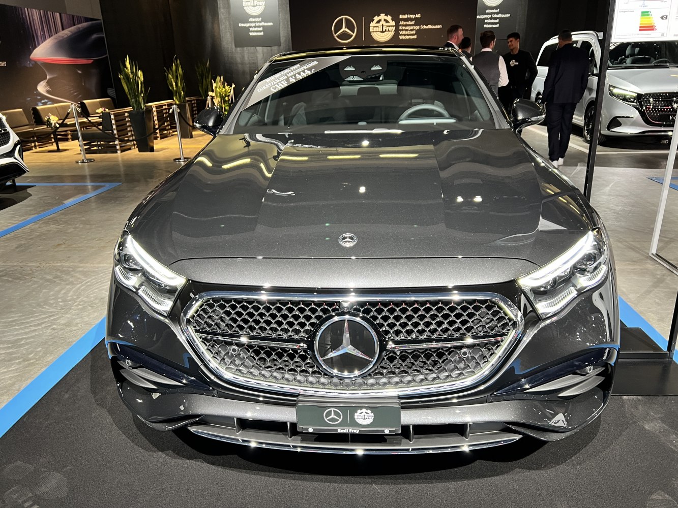 Front grille and LED headlights of a modern luxury sedan