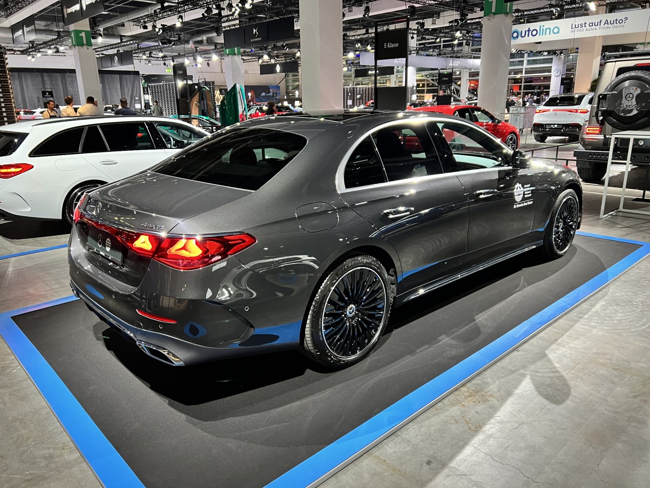 Rear view and side profile with tail lights and alloy wheels