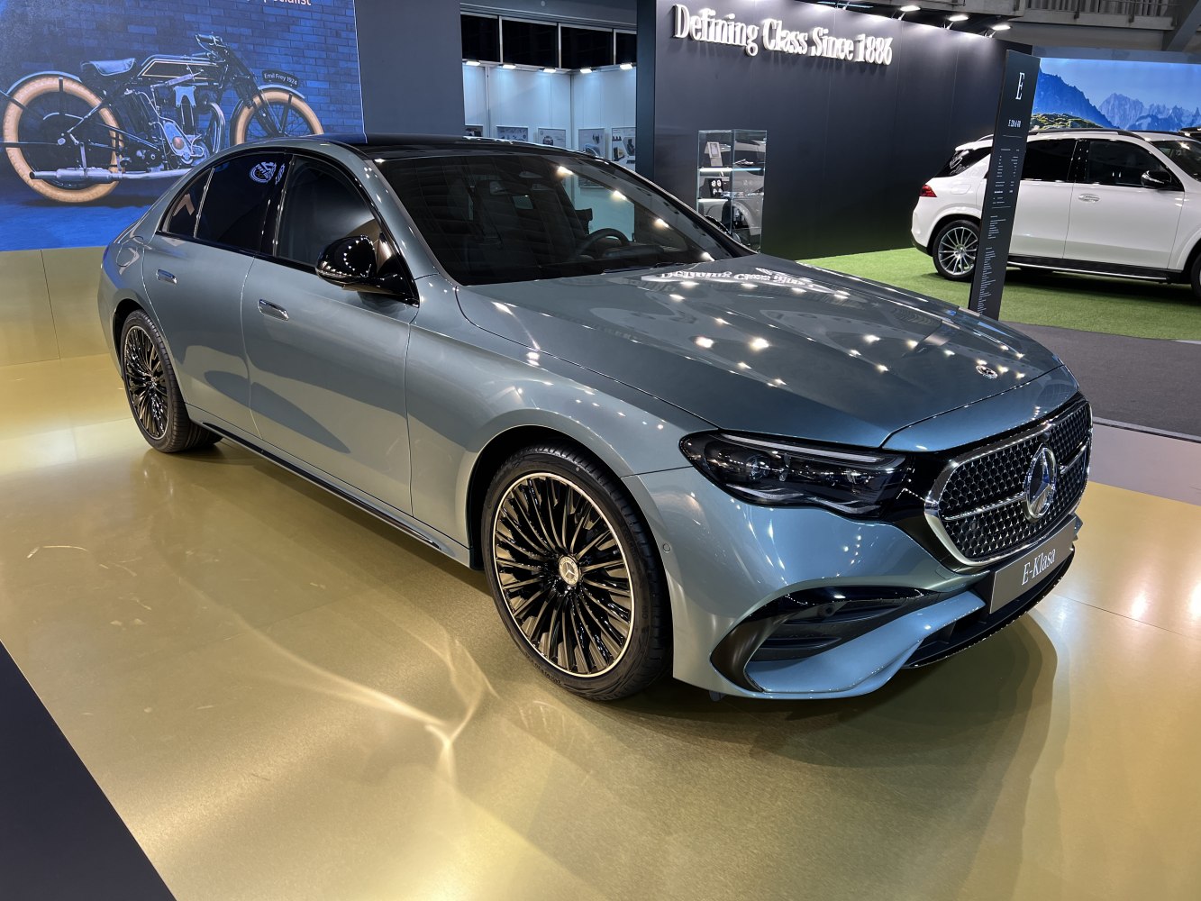 Luxury sedan with distinctive front grille and multi-spoke alloy wheels