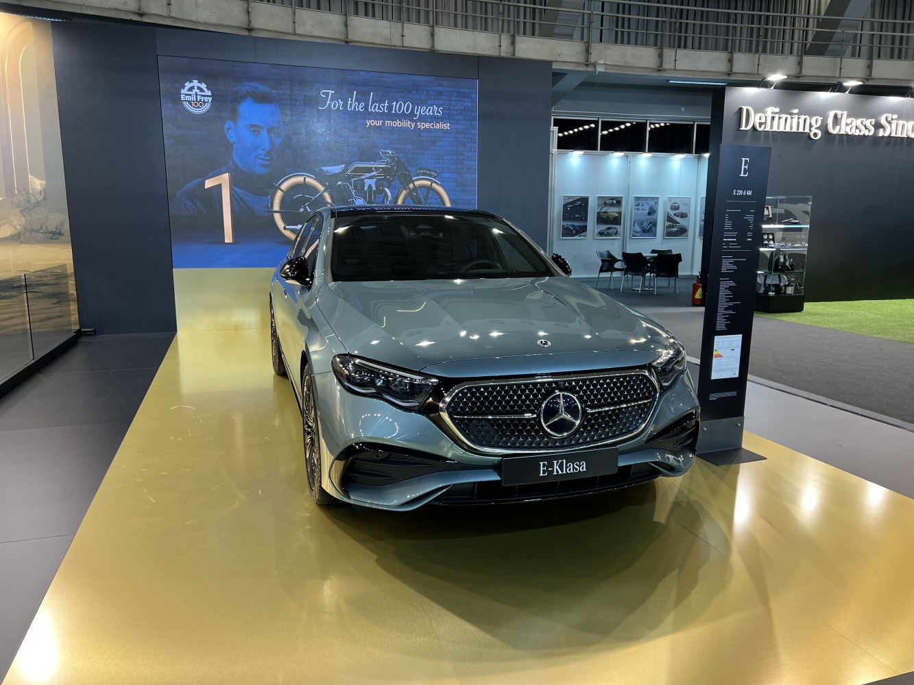 Front grille and headlight design of luxury sedan.