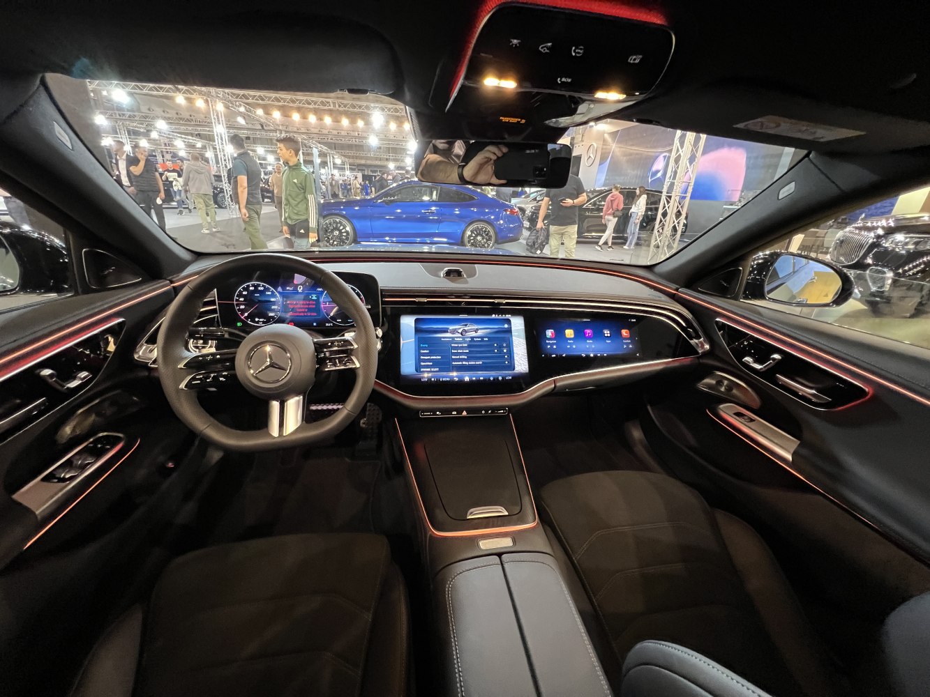 Digital dashboard and ambient lighting in luxury car interior