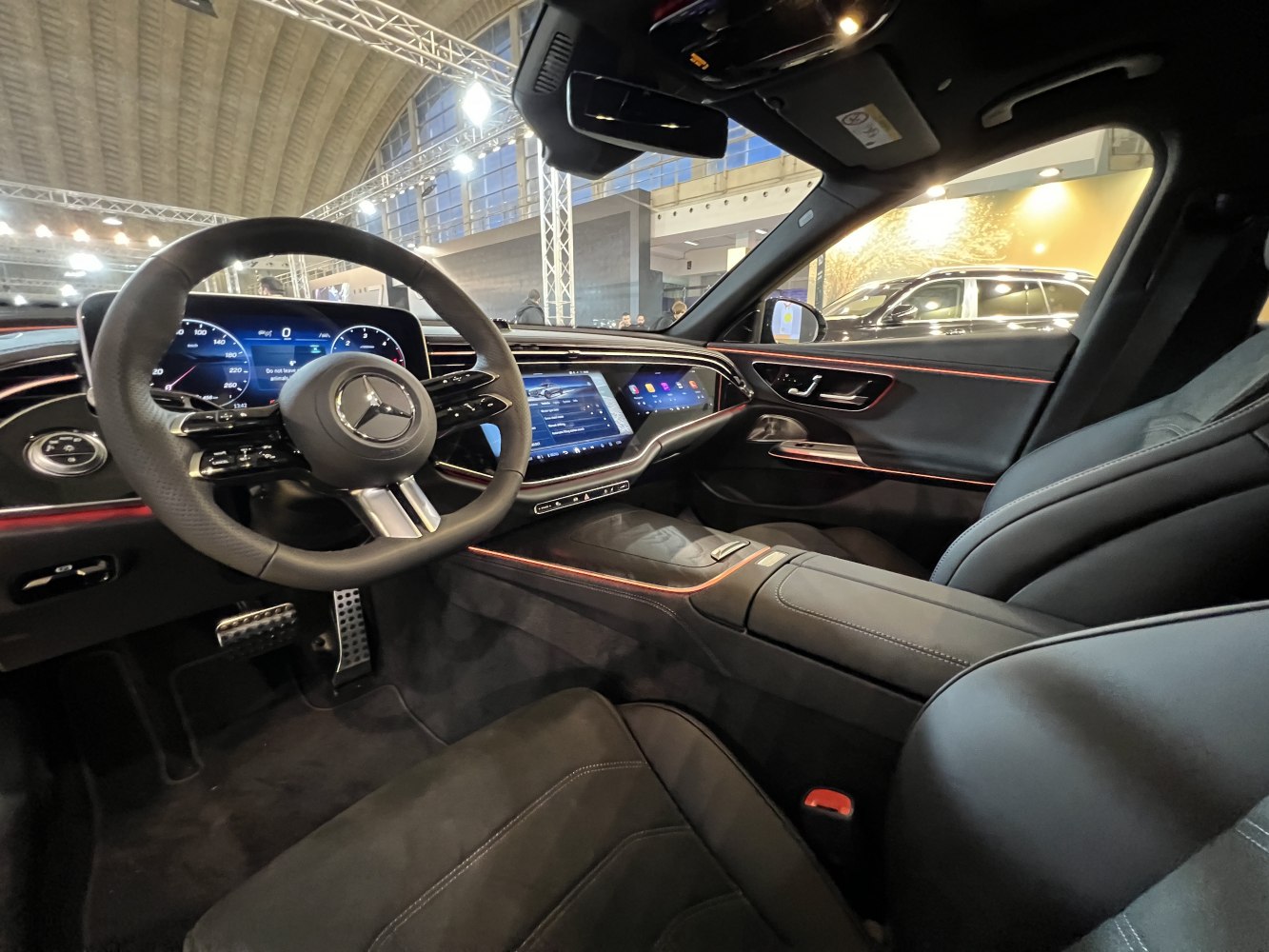 Digital dashboard and dual touchscreen infotainment with ambient lighting