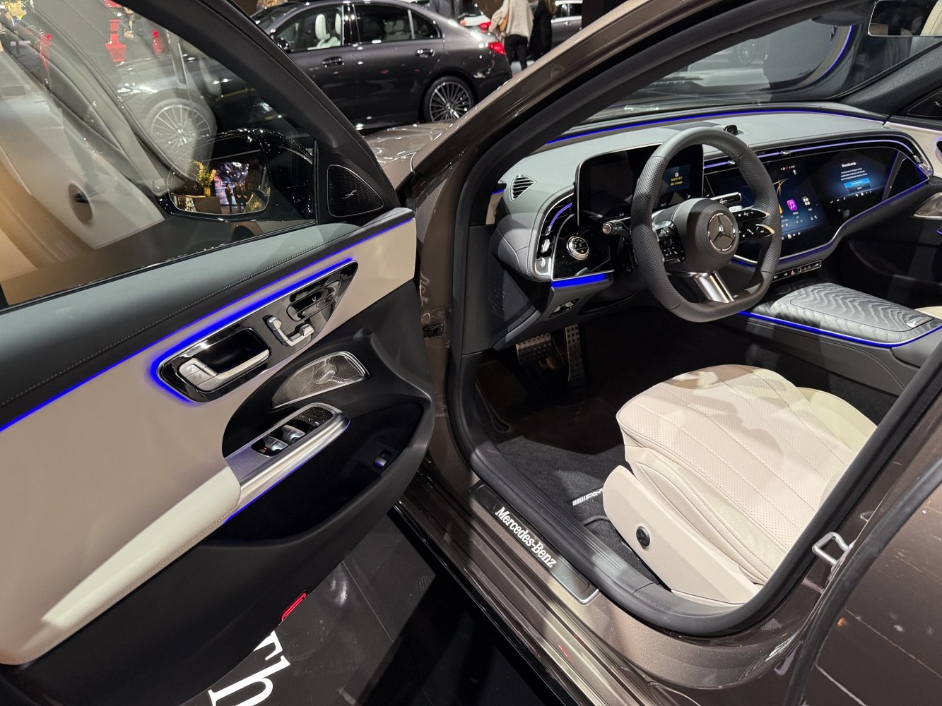 Modern digital dashboard and ambient lighting in luxury car interior
