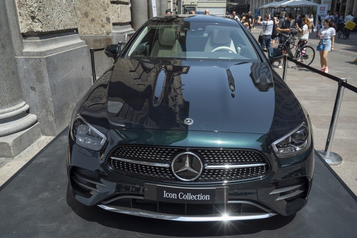 Front view of a luxury coupe with distinctive grille and headlights.