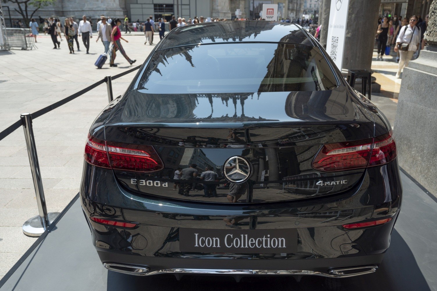 Sleek rear view with distinctive tail lights and badge detailing