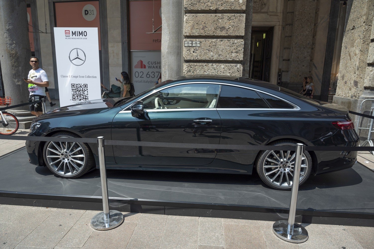 Sleek side profile with aerodynamic roofline and premium alloy wheels