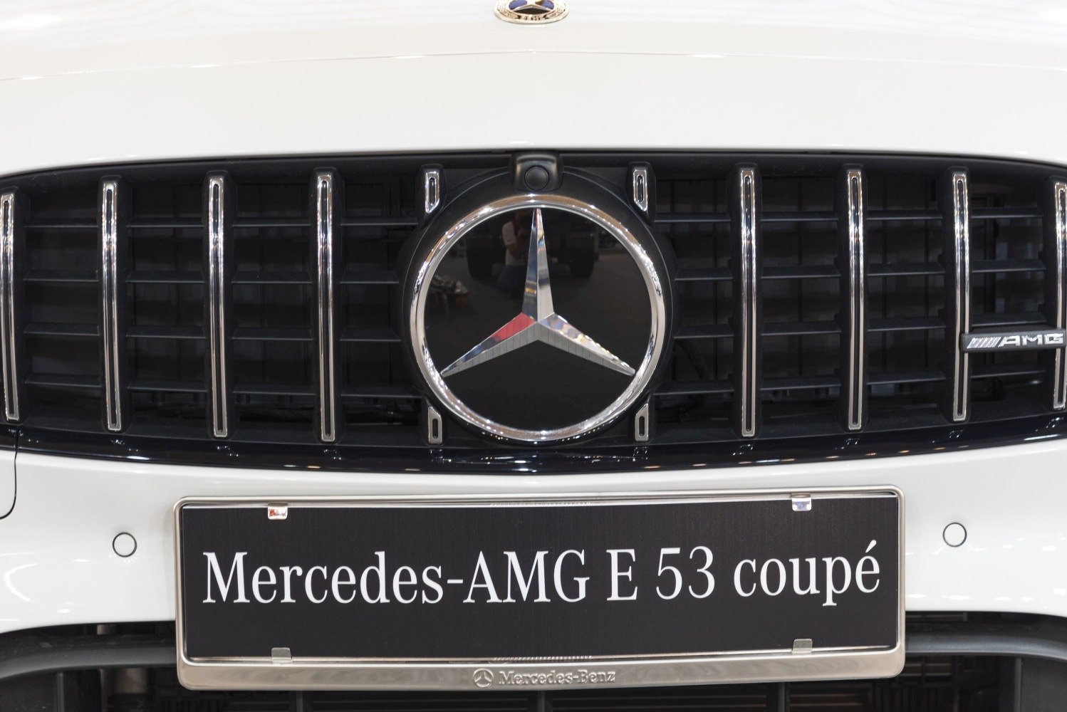 Front grille with iconic star emblem and AMG badge.
