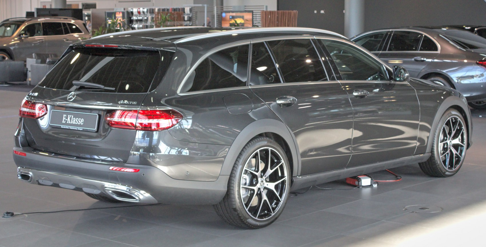 Rear side view with taillights and alloy wheels