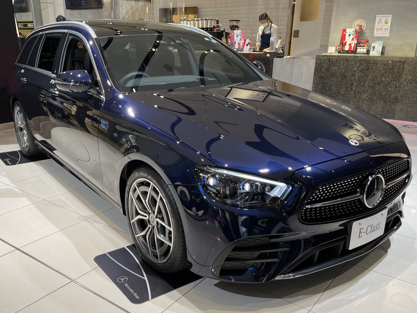 Front and side angled view showing headlights and alloy wheels