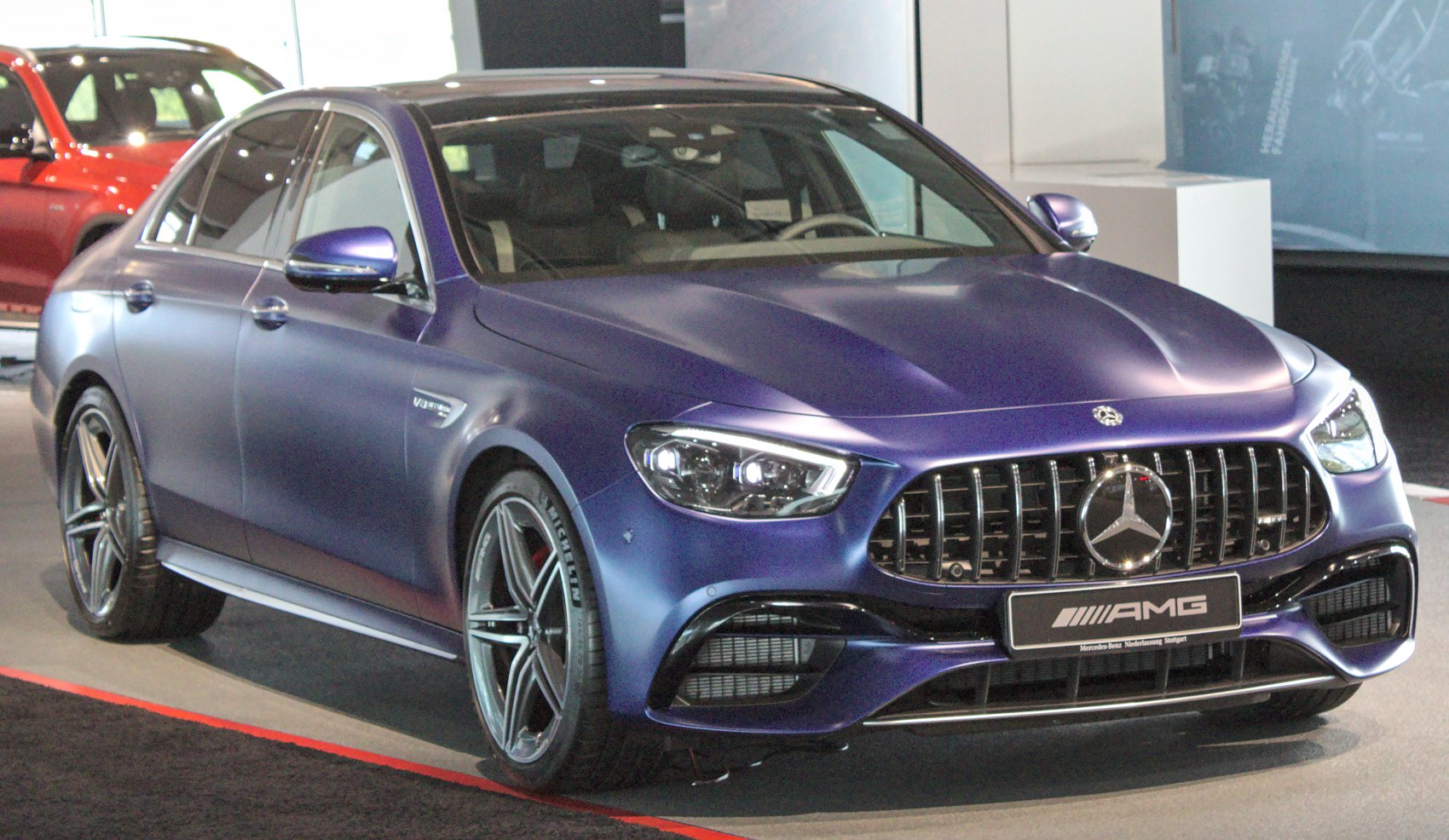 Luxury sedan with vertical grille and sporty front design