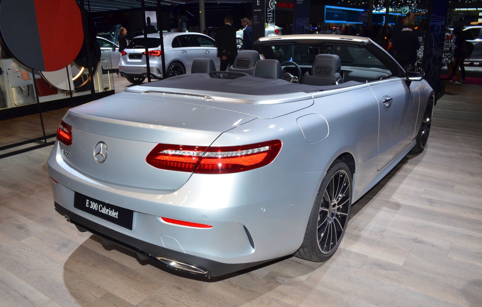 Convertible rear view with sleek taillights and alloy wheels