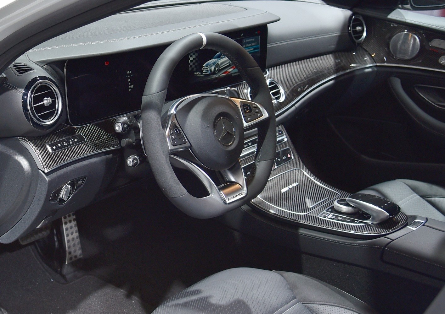 AMG steering wheel with carbon fiber dashboard and center console trim