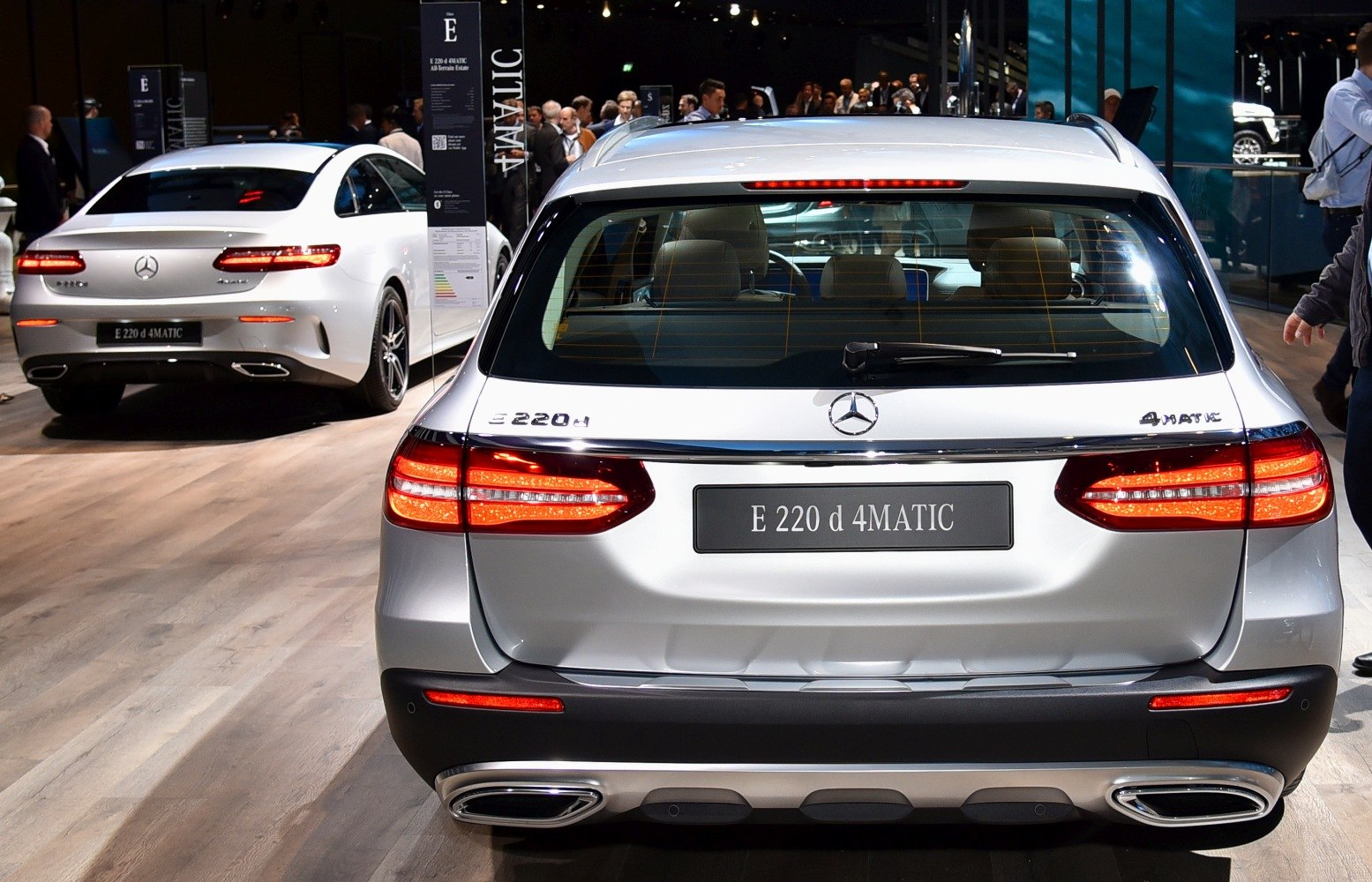 Rear view of a silver estate with LED taillights and 4MATIC badge
