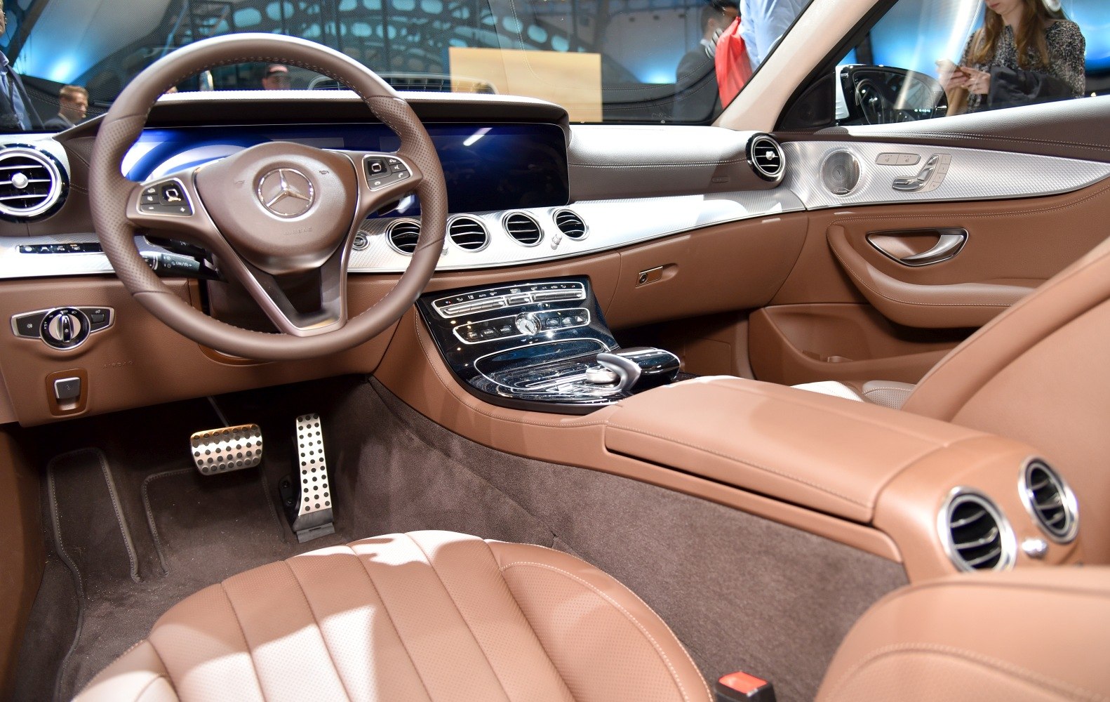 Brown leather interior with modern dashboard and steering wheel