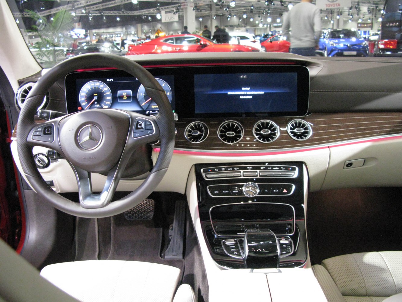 Luxury dashboard with digital instrument cluster and wood trim