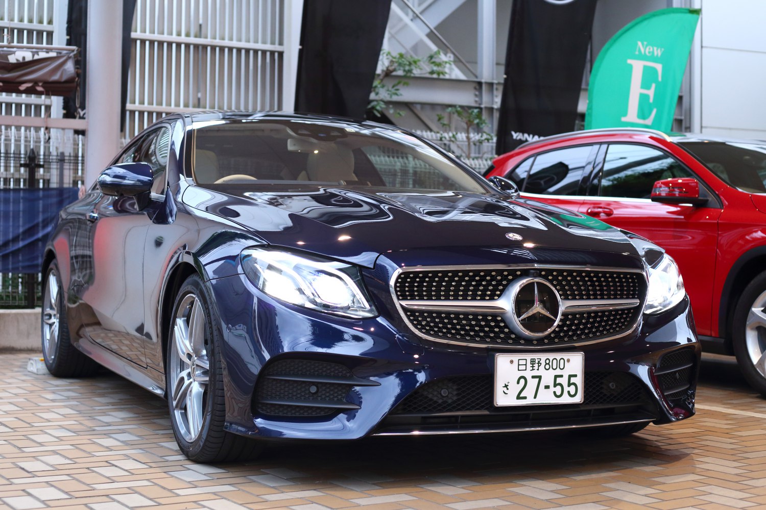 Front view with LED headlights and diamond grille
