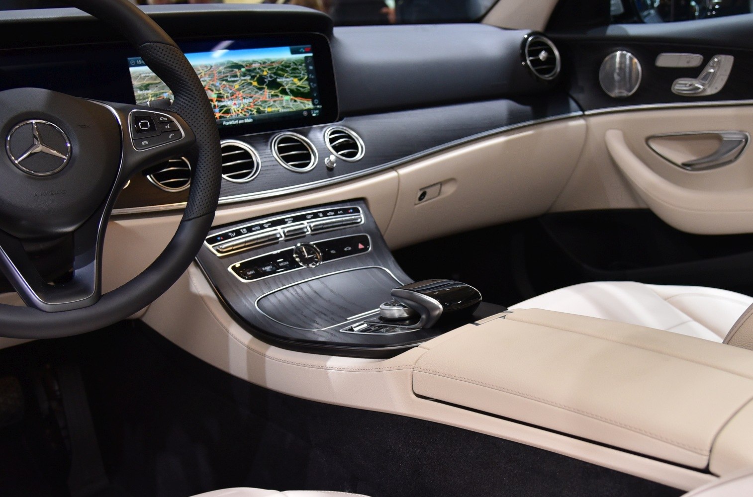 Luxurious car interior with advanced dashboard and steering wheel controls
