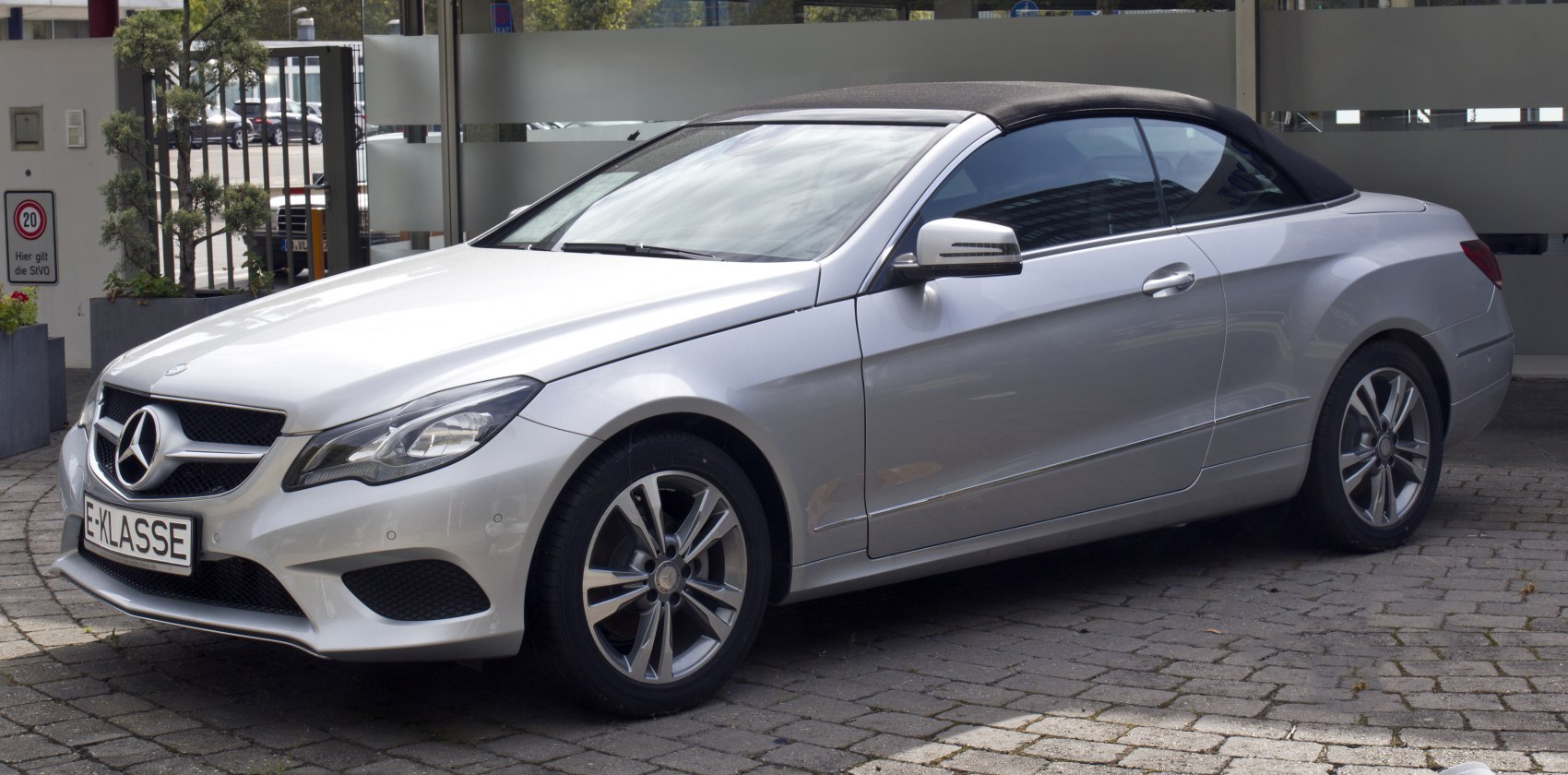 Silver convertible with front grille and alloy wheels